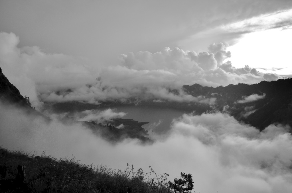 clouds over a volcanic crater